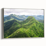 Framed canvas featuring a vintage-style landscape painting of Belize with vibrant colors on a black background.