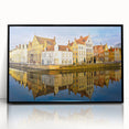 Large abstract wall art depicting a European cityscape in muted gray and blue tones, framed in black acrylic.