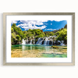 Extra large abstract art print of a Croatian landscape in muted blues and greens, framed in silver.