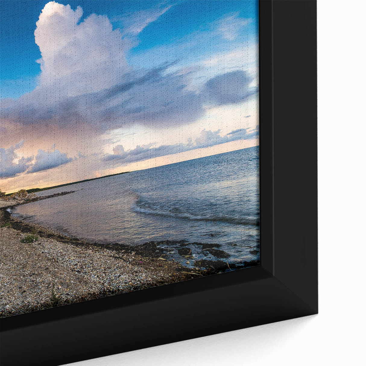 Extra large framed canvas featuring a textured depiction of a European scenery in black with vibrant color accents.
