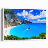 Vintage poster art of a scenic Greek landscape on a framed canvas, featuring vibrant blue and white tones.