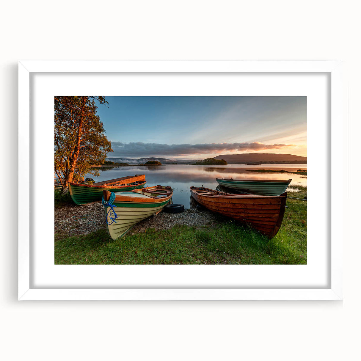 Textured abstract art print of an Irish landscape in muted green and blue tones on a framed canvas, ideal for bedroom art.