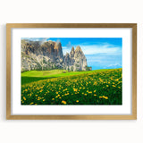 Abstract art print of the Dolomites in muted earth tones on a gold-framed canvas, suitable for dining room decor.