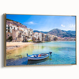 Framed canvas featuring a vintage-style landscape painting of Sicilian scenery, in muted gold and black tones.