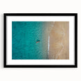 Abstract art print of the Mediterranean Sea with vibrant blue and white hues on a textured canvas, framed in black.