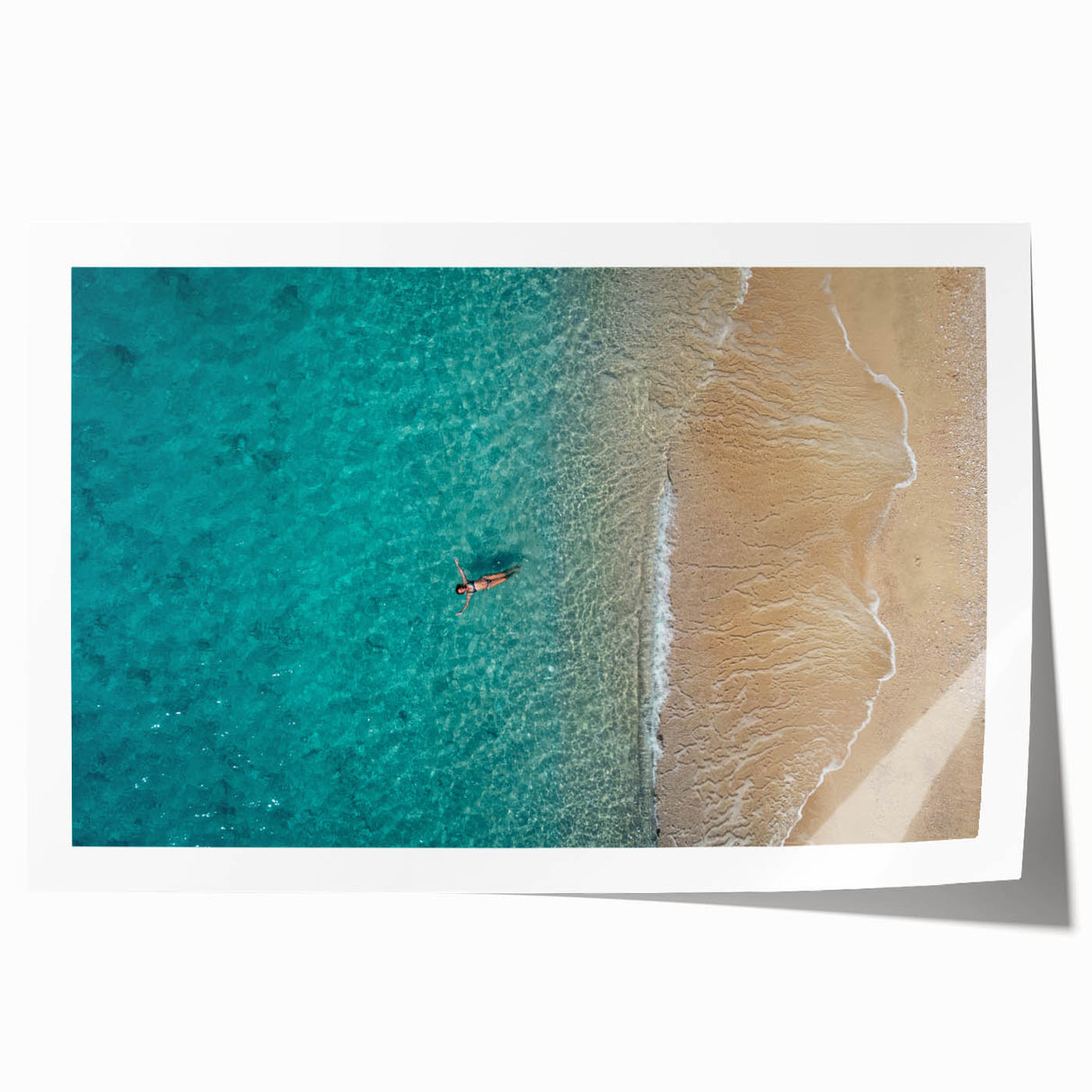 Extra large rolled print of a Mediterranean seaside town with vibrant blues and whites, ideal for art wall dining room.