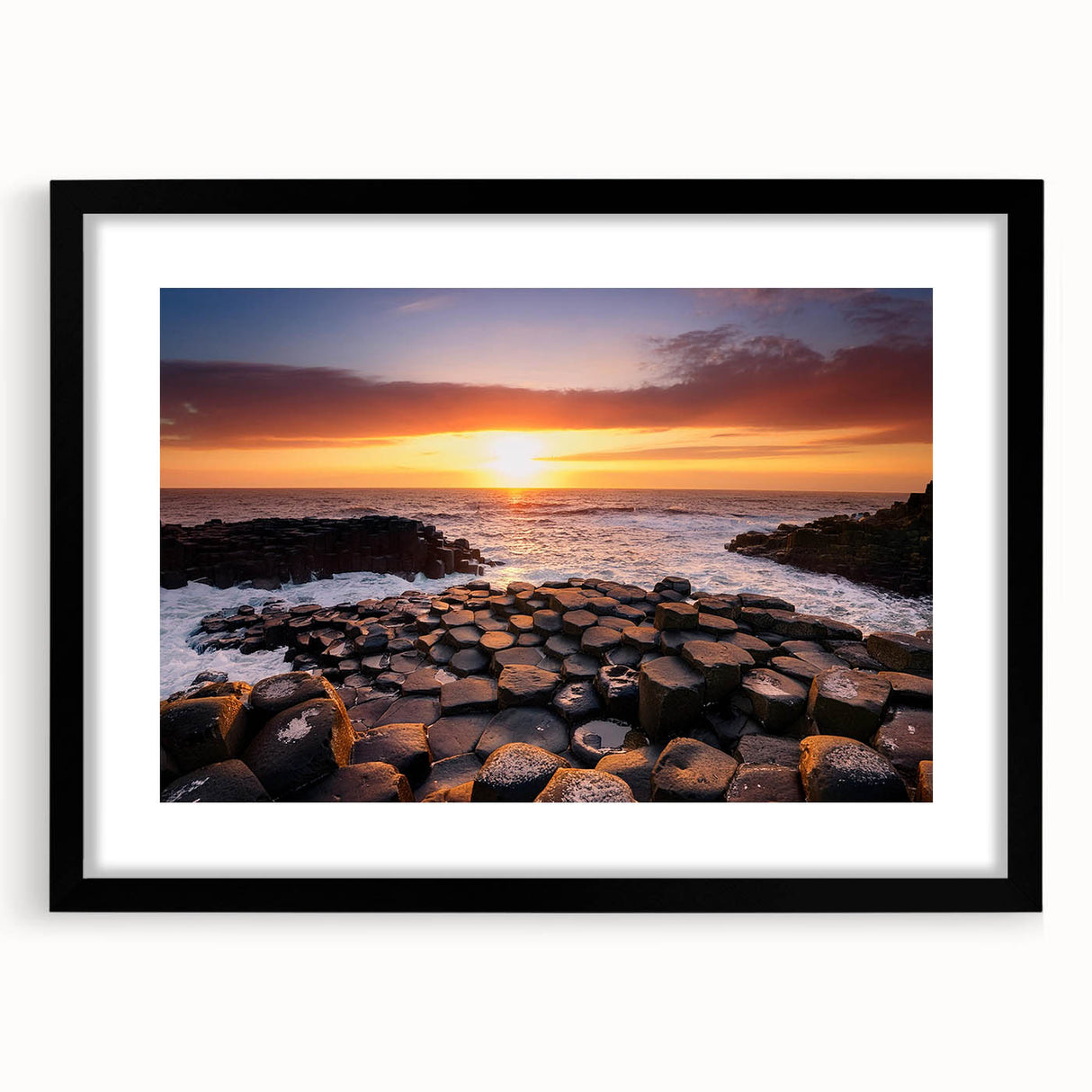Abstract art print of a colorful, textured landscape in vibrant hues on a large framed canvas, ideal for living room decor.