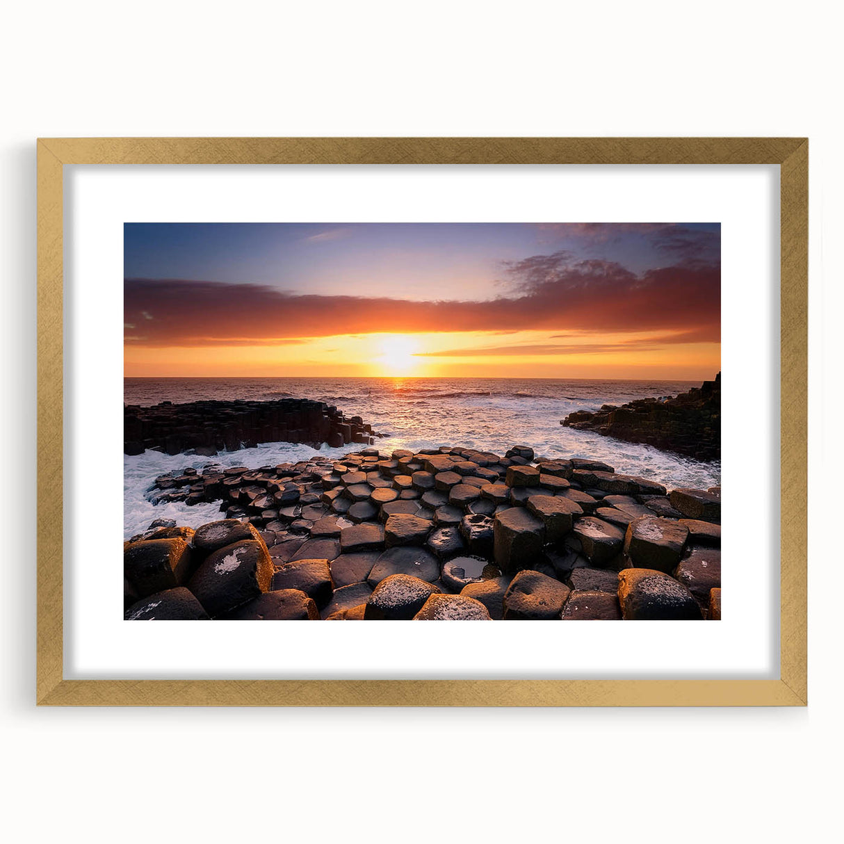 Abstract art print of Northern Ireland scenery in muted green and blue tones, framed in gold, suitable for dining room decor.