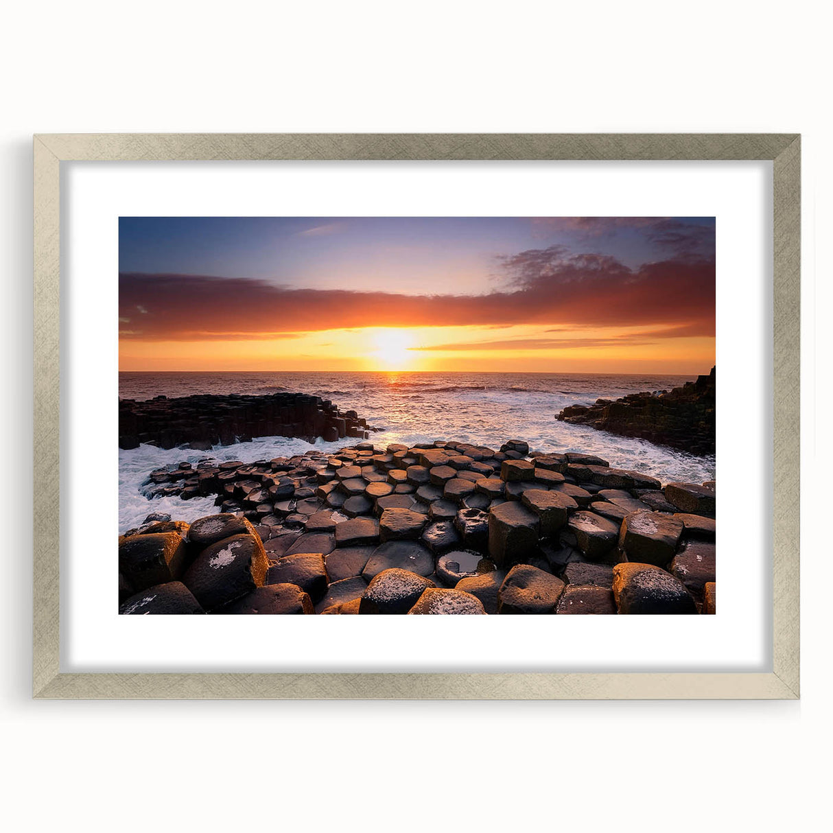 Extra large abstract art print of Northern Ireland scenery, in muted green and blue tones, framed with a silver mat.