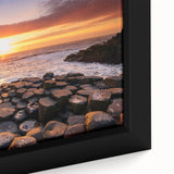 Black wall art depicting a textured Northern Ireland scenery in vibrant colors on a framed canvas.