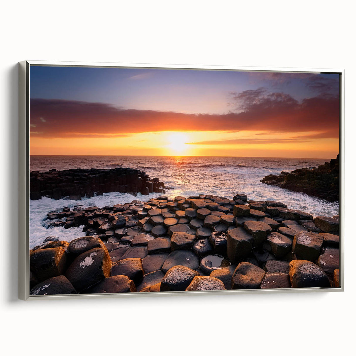 Framed canvas landscape art painting of Northern Ireland's coastline in muted greens and blues.