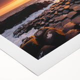 Art deco poster of Northern Ireland scenery in muted green and blue tones on rolled canvas.