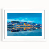 Textured art depicting an abstract Lisbon cityscape in muted earth tones, framed with a white mat, ideal for bedroom decor.