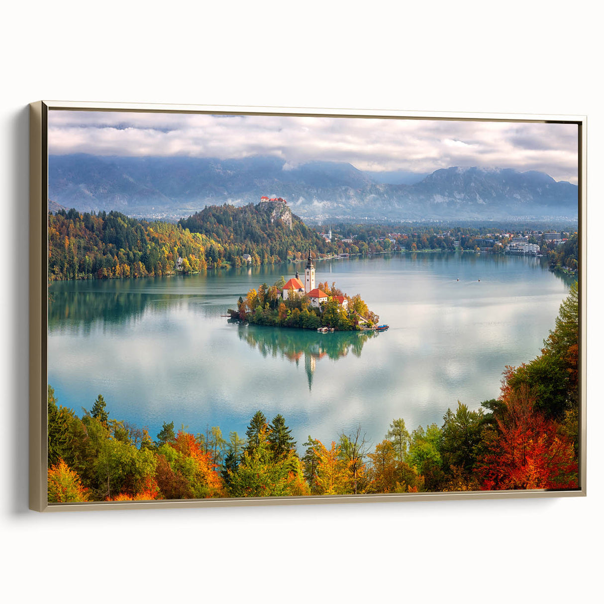 Framed canvas featuring a vintage-style landscape painting of a Slovenian scenery, with vibrant green and blue tones.