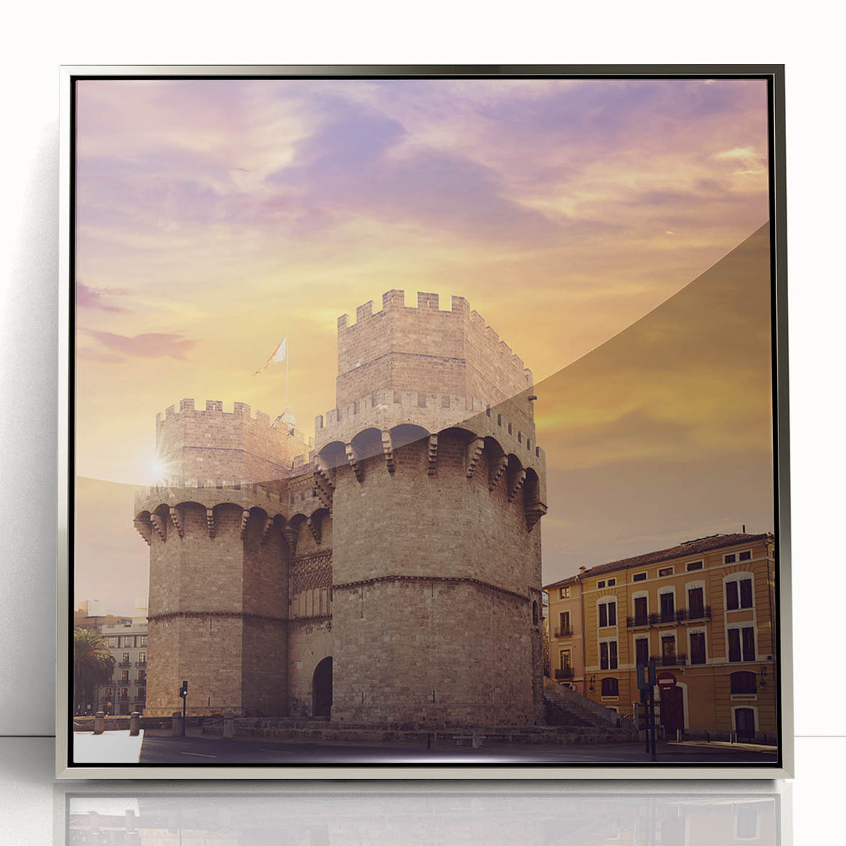 Mid-century modernist art depicting Valencia scenery in muted earth tones on a silver-framed acrylic print.