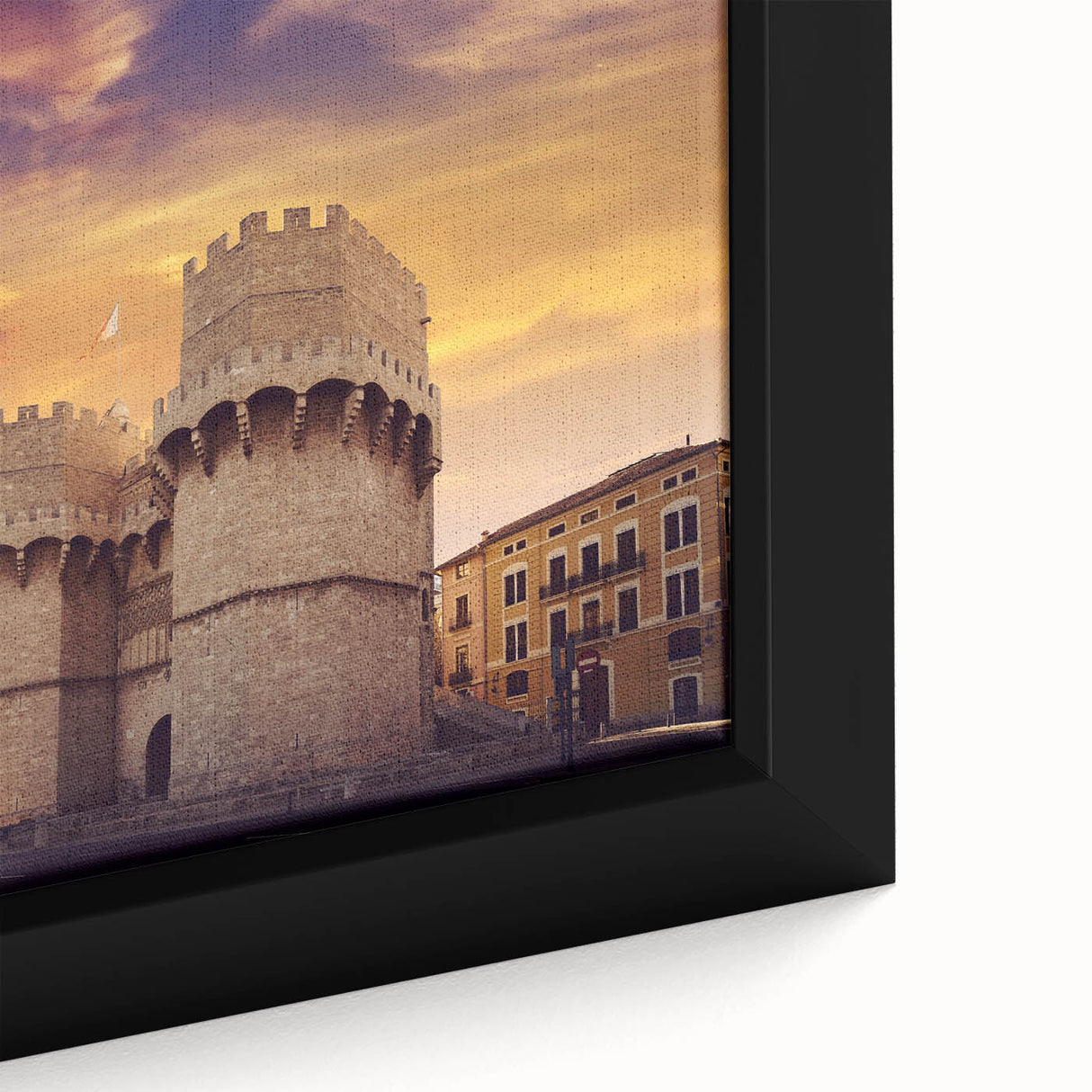 Extra large framed canvas depicting a textured, colorful street scene in Valencia with black wall accents.