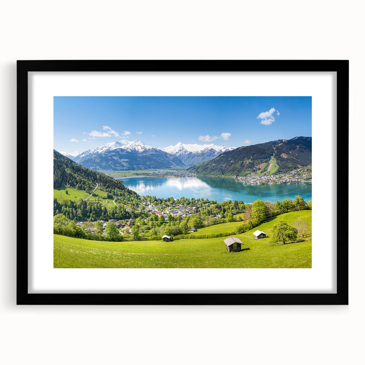Extra large abstract art print of a colorful Swiss landscape, textured appearance, in a black frame with mat.