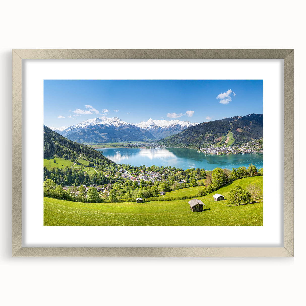Textured art print depicting an abstract European landscape in muted earth tones, framed in silver, ideal for bedroom decor.