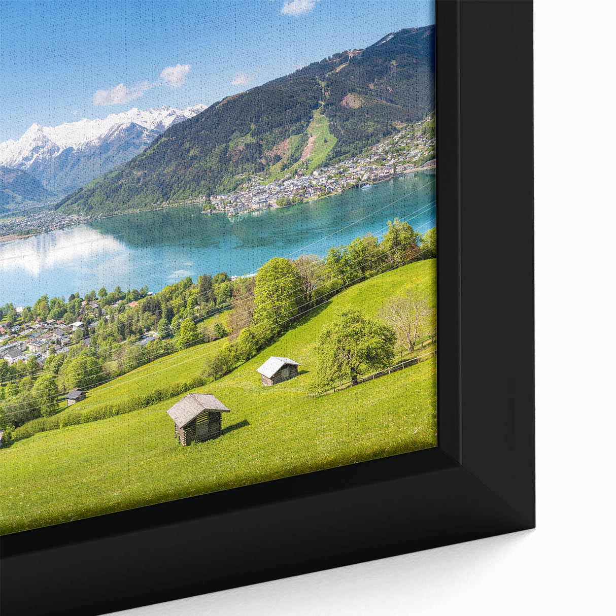 Extra large framed canvas of a textured Swiss landscape in black with colorful accents, ideal for living room decor.