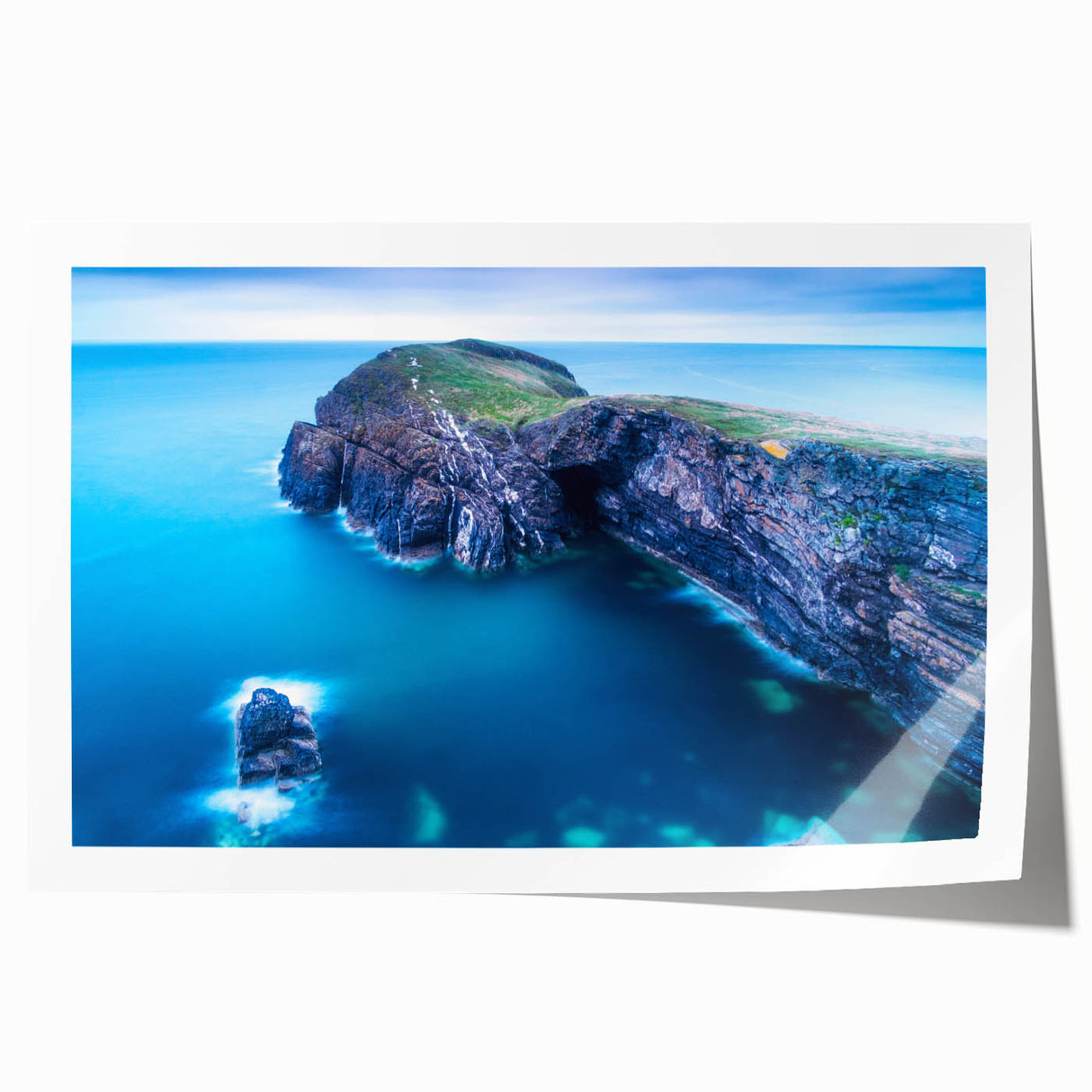 Rolled print of a Welsh landscape featuring lush greenery and floral elements, suitable for dining room wall art.