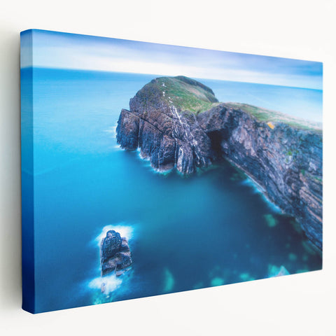 Large stretched canvas featuring a scenic Welsh landscape in muted green and blue tones, ideal for kitchen wall art.