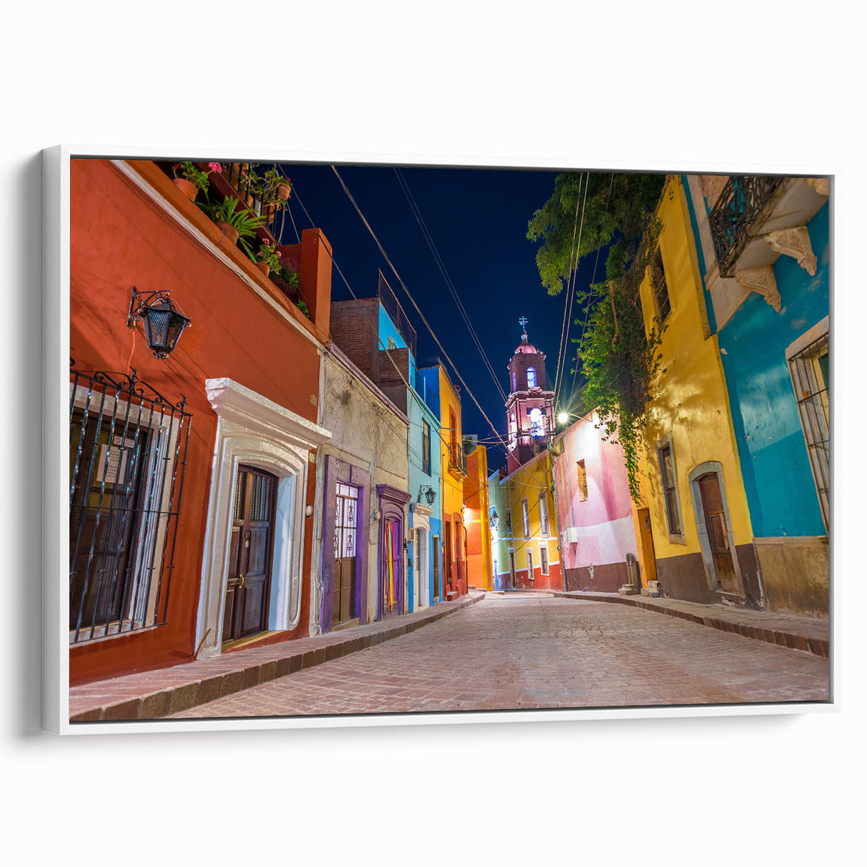 Vintage poster art of Guanajuato, Mexico in vibrant colors on a white-framed canvas, suitable for living room decor.