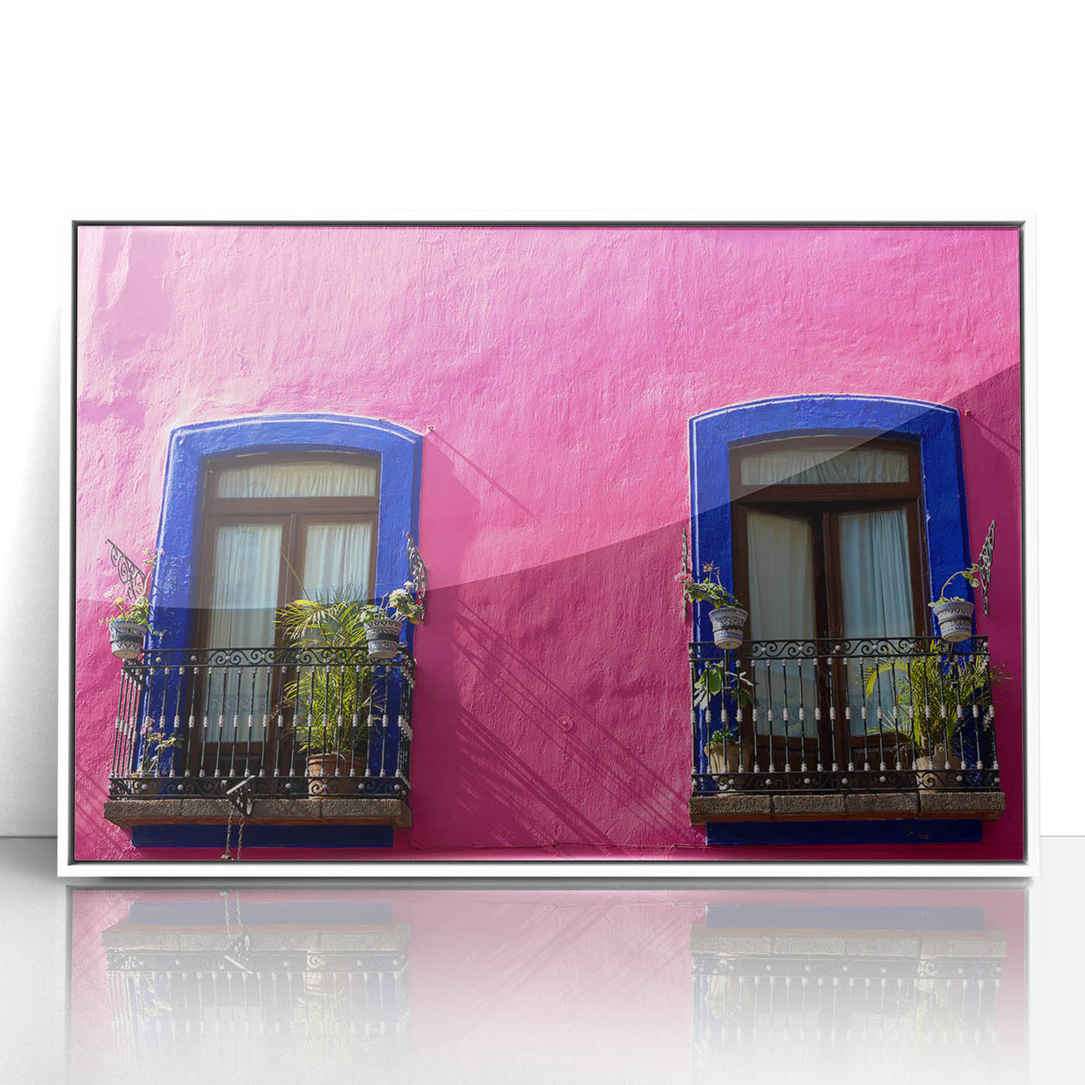 Acrylic print of Oaxaca scenery with art deco elements in white frame, suitable for modern nursery decor.