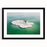 Extra large abstract art print of the Dead Sea in colorful, textured style on a black framed canvas.