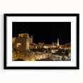 Abstract art print of Jerusalem scenery in vibrant, textured colors on a large framed canvas, ideal for living room decor.
