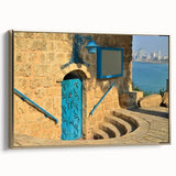Vintage poster art of Tel Aviv landscape, featuring muted gold and black hues on a framed canvas.