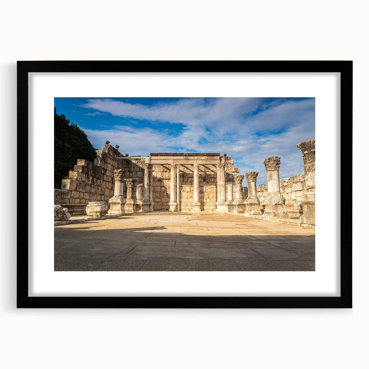 Extra large abstract art print of a Middle Eastern scenery in vibrant colors on a textured canvas, framed in black.