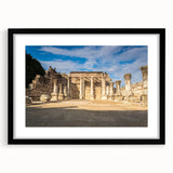 Extra large abstract art print of a Middle Eastern scenery in vibrant colors on a textured canvas, framed in black.