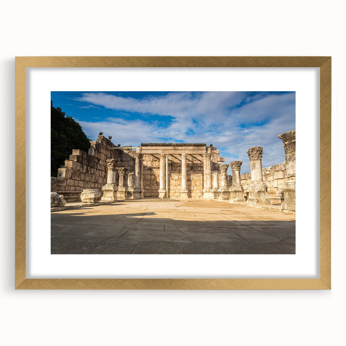 Extra large abstract art print depicting a Middle Eastern scenery in textured gold tones, framed with mat.