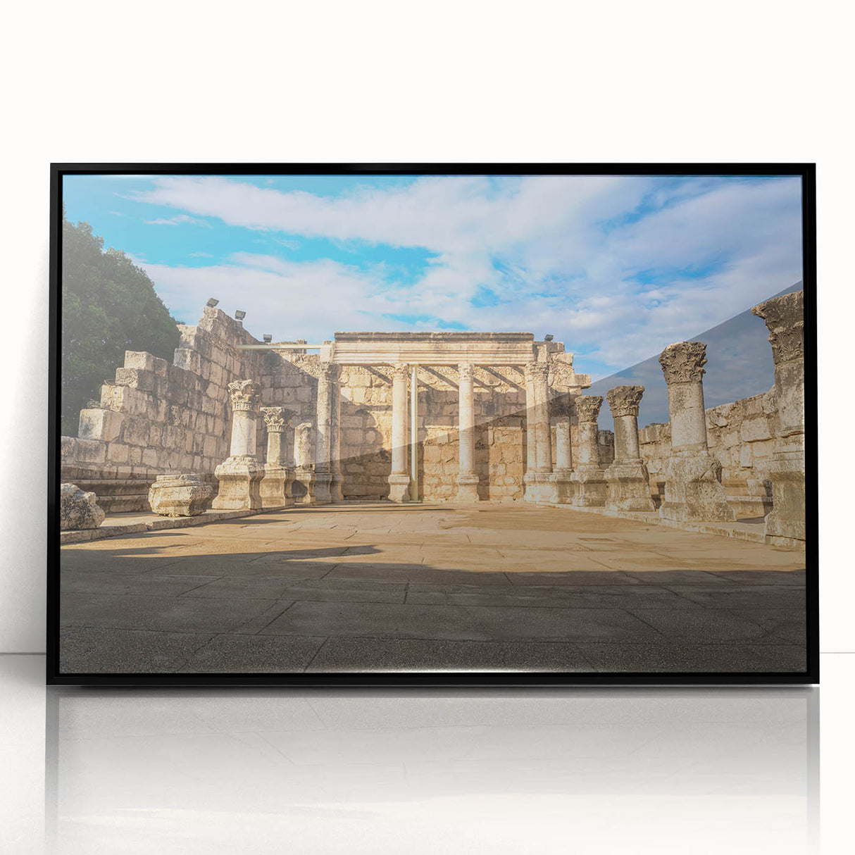 Large abstract wall art featuring a monochrome depiction of Middle Eastern scenery, presented in a black framed acrylic.