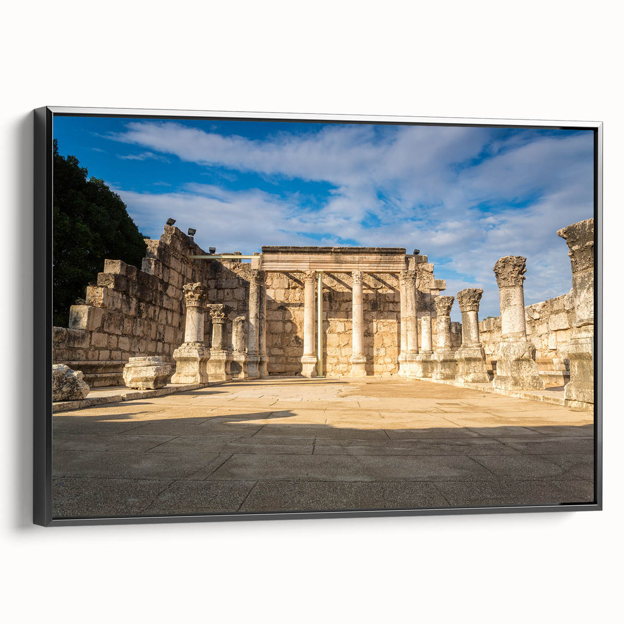Black and white wall art featuring a vintage poster-style landscape of a Middle Eastern scenery on framed canvas.