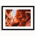 Extra large abstract art print depicting a colorful, textured scenery of the Middle East, framed in black.