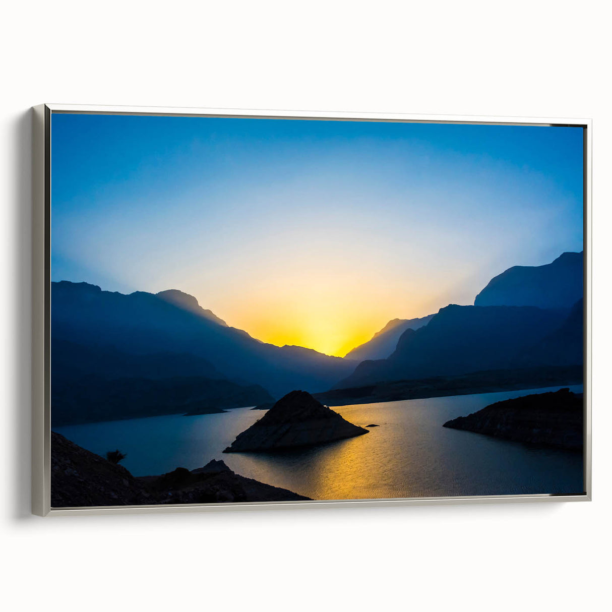 Framed canvas featuring a vintage landscape painting of Oman with silver accents in colorful and black tones.