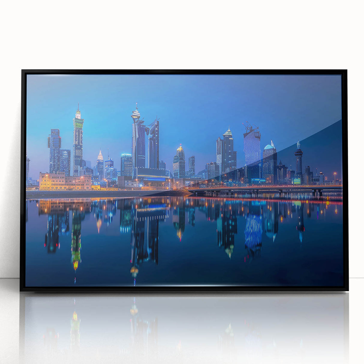 Large abstract wall art depicting a stylized Saudi Arabian landscape in muted earth tones, framed in black acrylic.