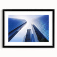 Extra large abstract art print of a colorful, textured Abu Dhabi skyline on a black framed canvas.