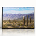 Large abstract wall art depicting a stylized Argentine landscape in muted earth tones, framed in black acrylic.