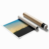 Rolled print of a Brazilian landscape with lush greenery and floral elements, in soft earth tones.