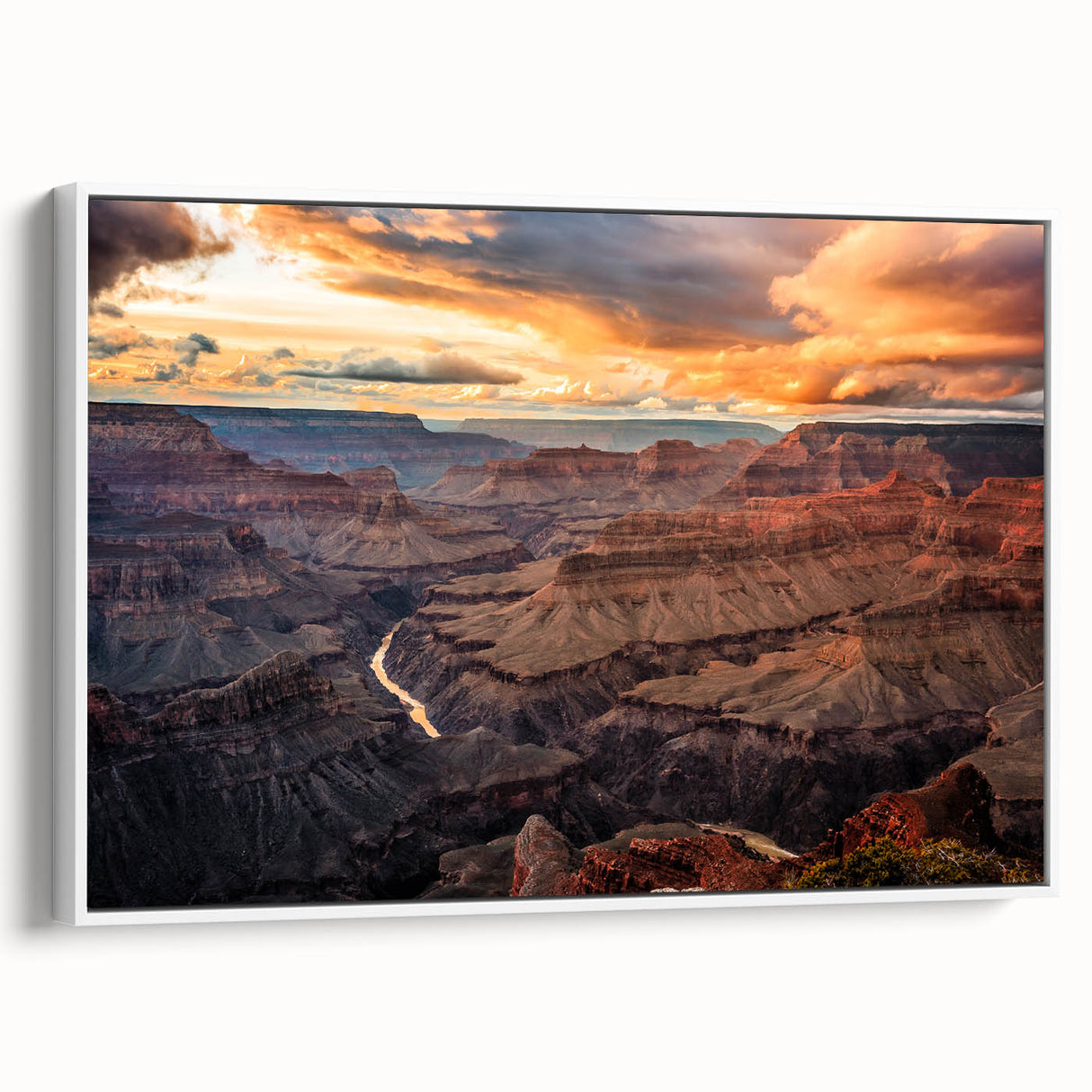 Vintage poster art of the Grand Canyon in colorful hues on a framed canvas, ideal for living room decor.