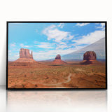 Large abstract wall art depicting Monument Valley in muted earth tones on a framed acrylic.