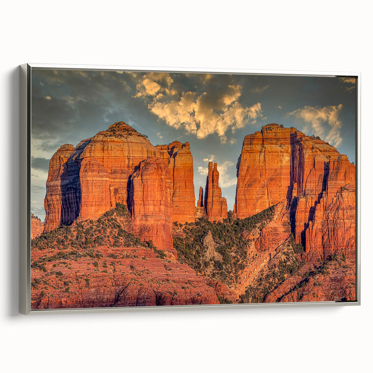 Framed canvas of Sedona landscape with vibrant red and orange tones, ideal for living room decor.