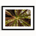 Colorful abstract art print of Big Sur in vibrant hues on a large, textured canvas, framed in black.