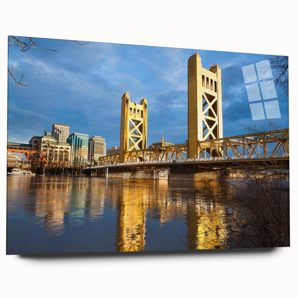 Large abstract wall art of Sacramento skyline in muted blue and gray tones on acrylic glass.