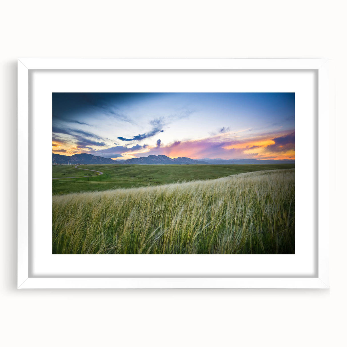 Abstract art print of Boulder, Colorado in muted earth tones on a framed white mat, ideal for dining room decor.