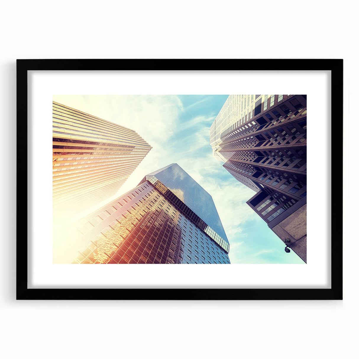 Extra large abstract art print of Denver scenery in vibrant colors on a textured canvas, framed with black mat.