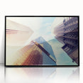 Large abstract wall art depicting Denver's skyline in muted gray and blue tones on a framed acrylic.