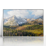 Acrylic print of the Rocky Mountains in muted earth tones, framed in white, suitable for modern art wall decor.